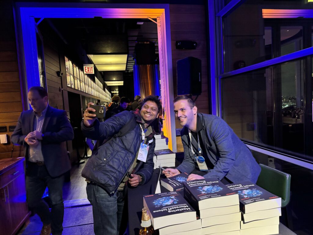 Book signing session at Microsoft Ignite 2024 sponsored by ControlUP and Nerdio